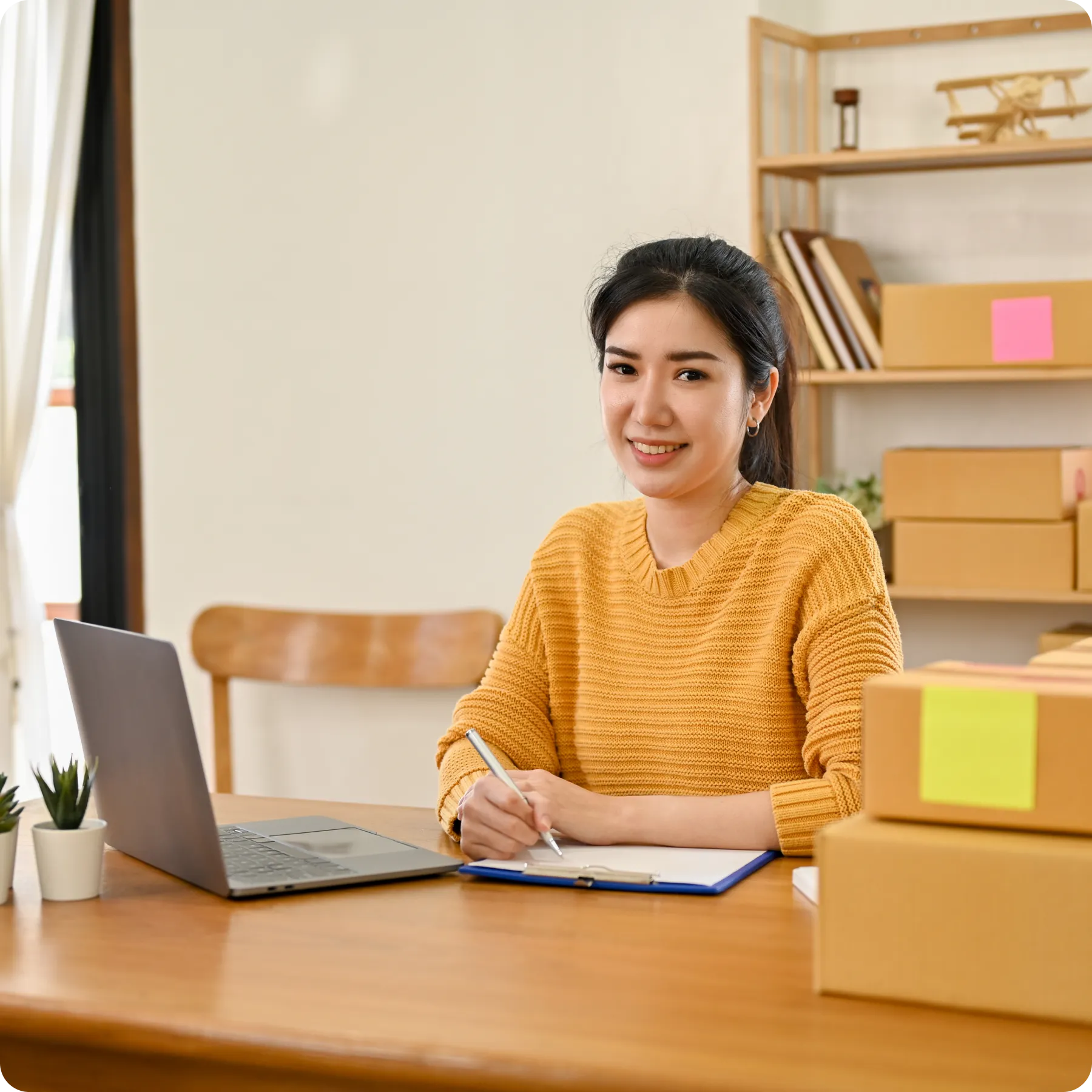 beautiful-millennial-asian-female-business-entrepreneur-working-her-business copy
