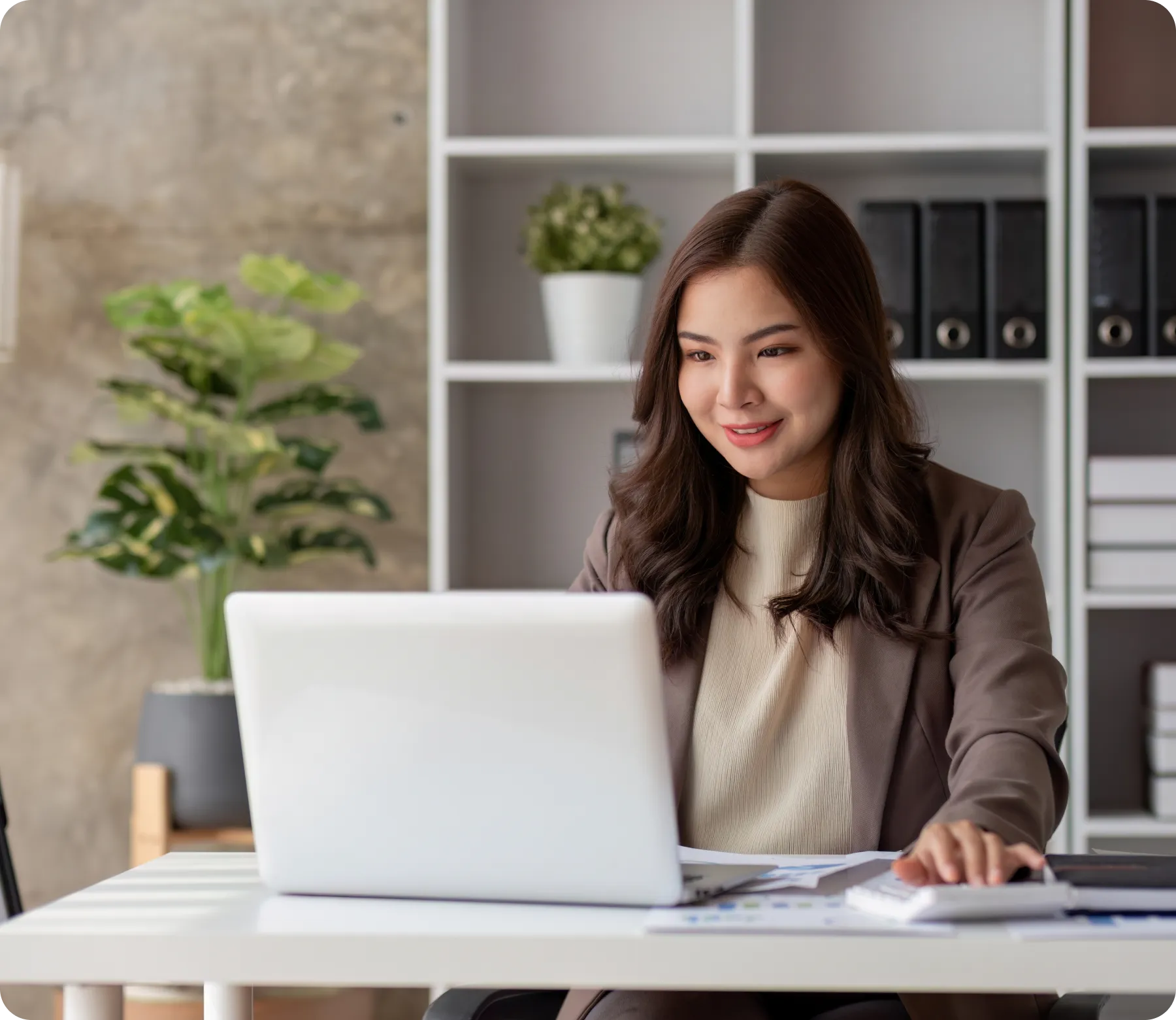 business-woman-using-calculator-math-finance copy